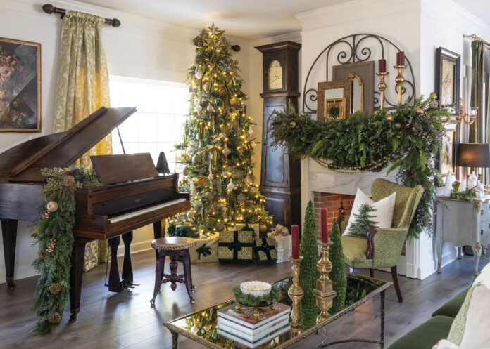 Living room with piano and Christmas greenery