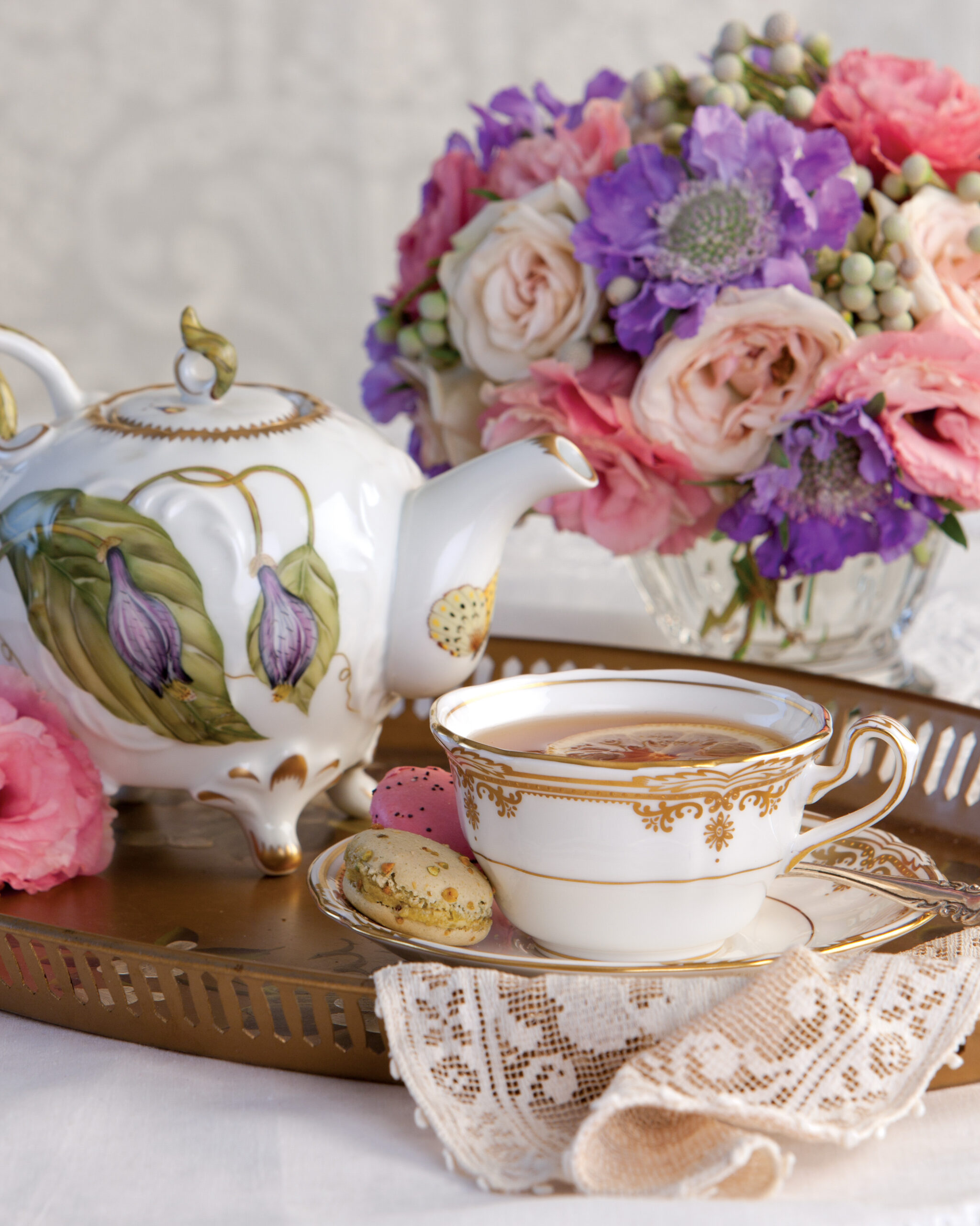 Flower bouquet with teapot and tea cup