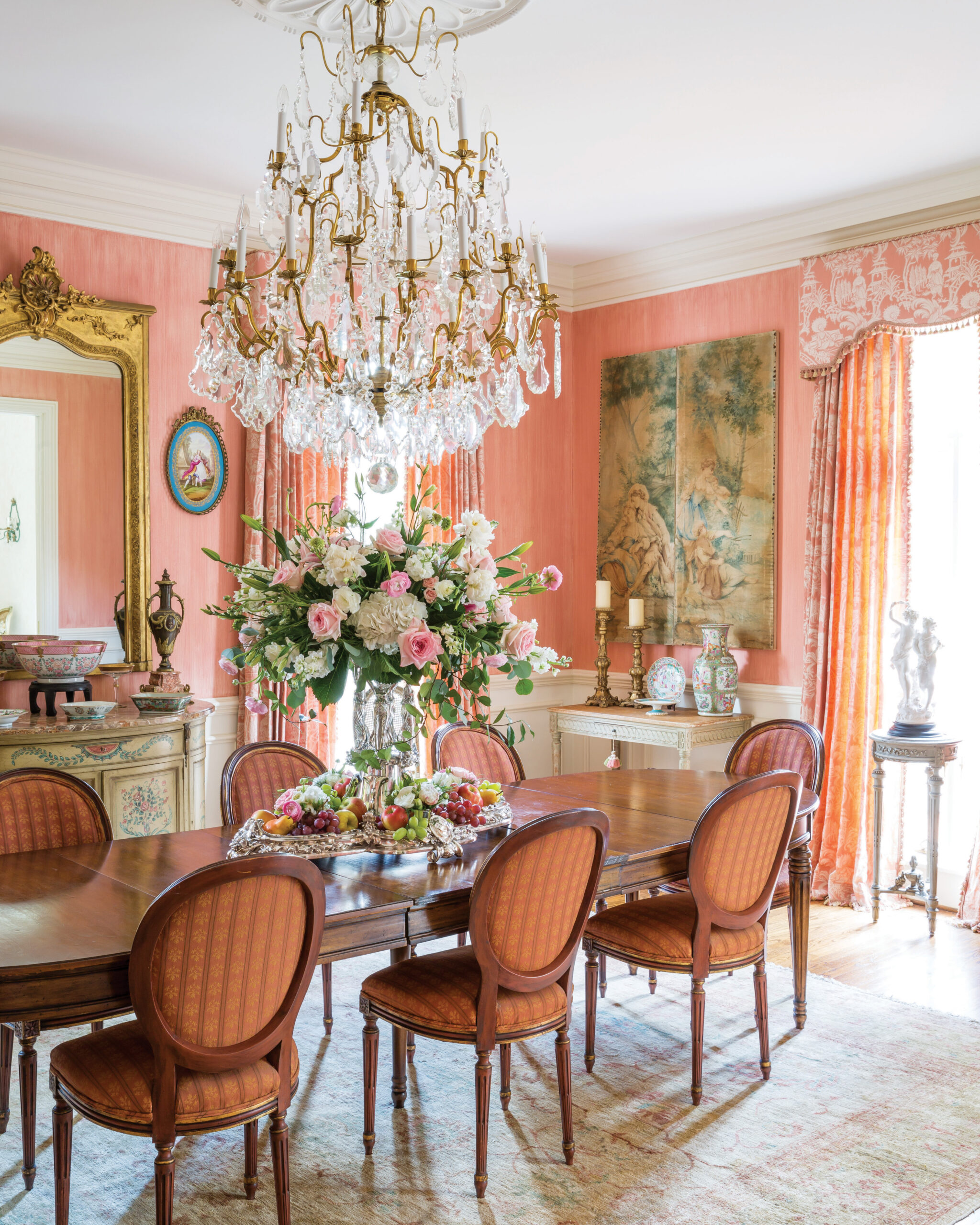 Pink ornate dining room in French chateau 
