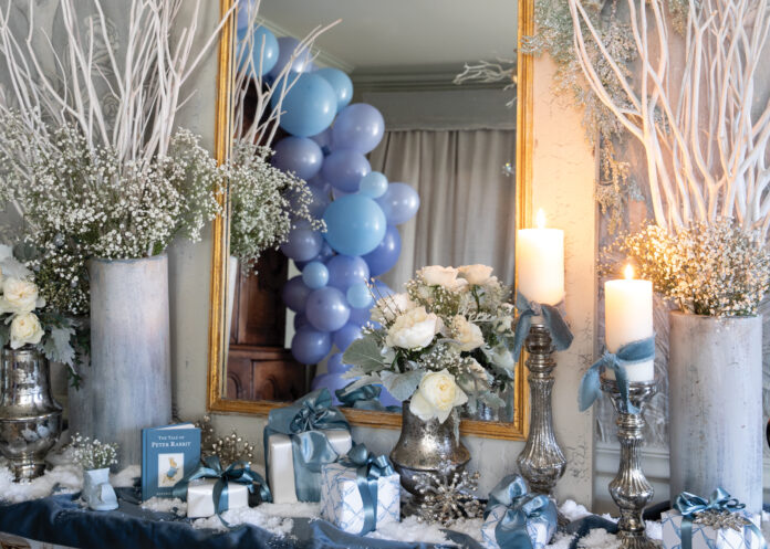 Wrapped gifts and baby shower decorations