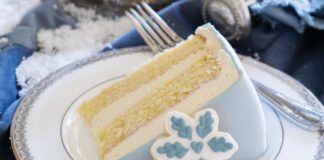 Slice of blue and white snowflake cake