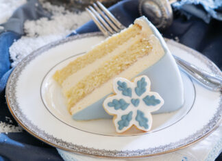 Slice of blue and white snowflake cake