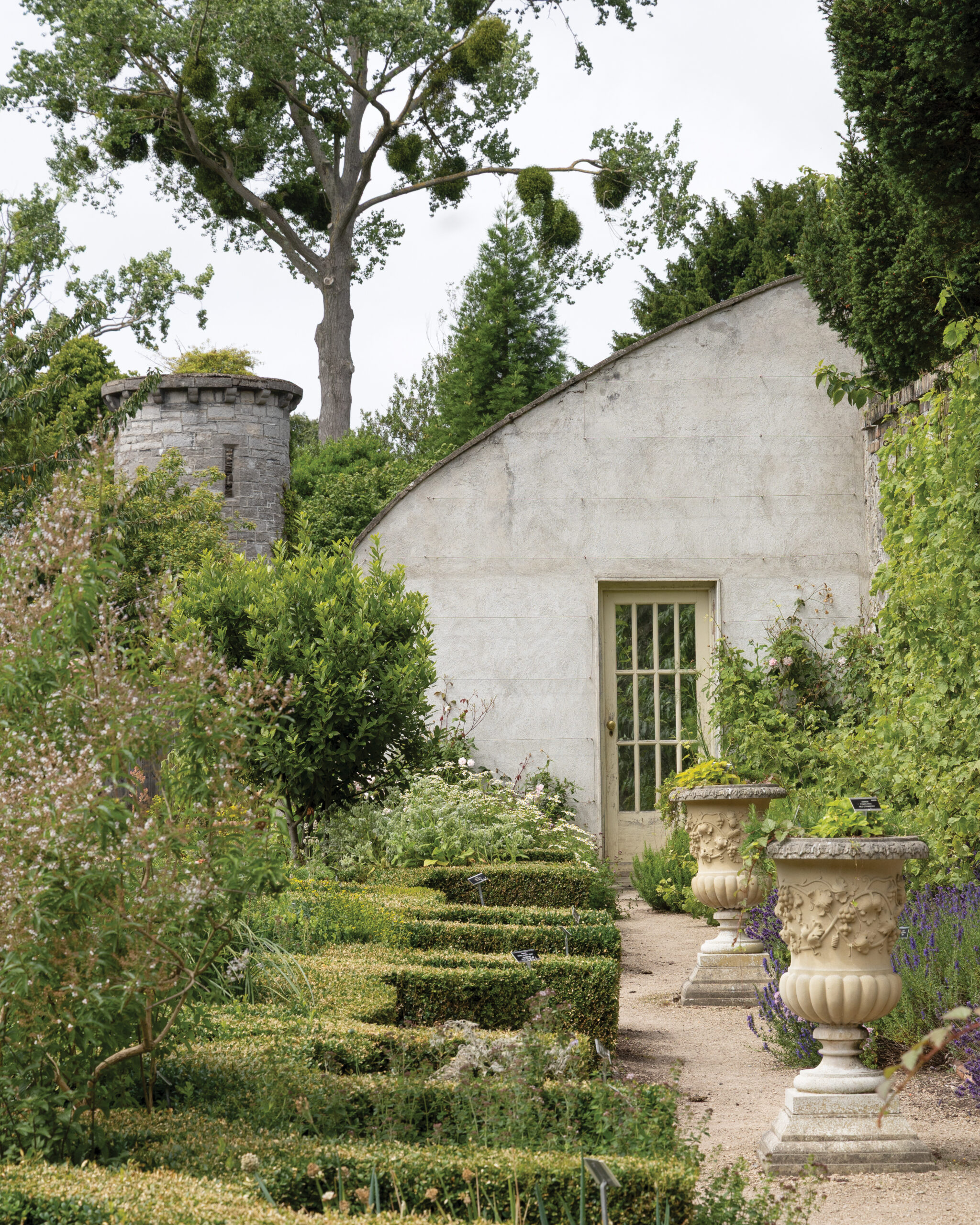 Garden area with stone greenhouse 