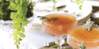 group of Grapefruit Rosemary Mimosas in coupe glasses