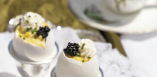 Caviar Eggs: carefully preserved eggshells filled with a silken egg custard, an airy crème frâiche mixture, the prized roe from various species of ancient sturgeon fish, and a sprinkle of chives.