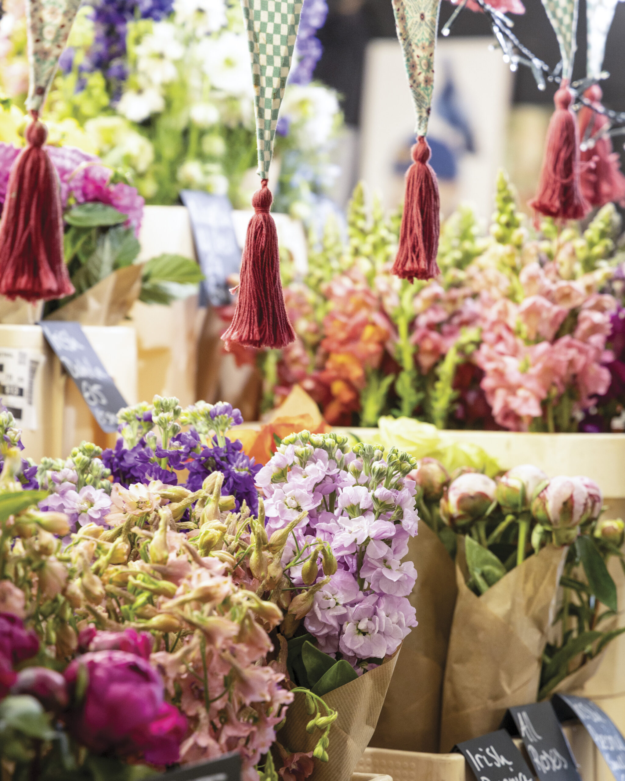 bunches of flowers inside a market in Cork, Ireland
