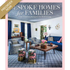 Book cover for 'Bespoke Homes for Families' featuring a chic blue-and-white living room, pink border, and a gold 'Preorder Now' ribbon.