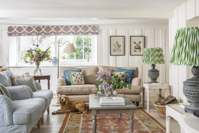 image of cottage living room with yellow dog