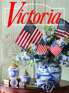 VIC_JA26_ - Victoria cover of Victoria magazine July/August cover with blue and white porcelain vase and american flag and flowers decor