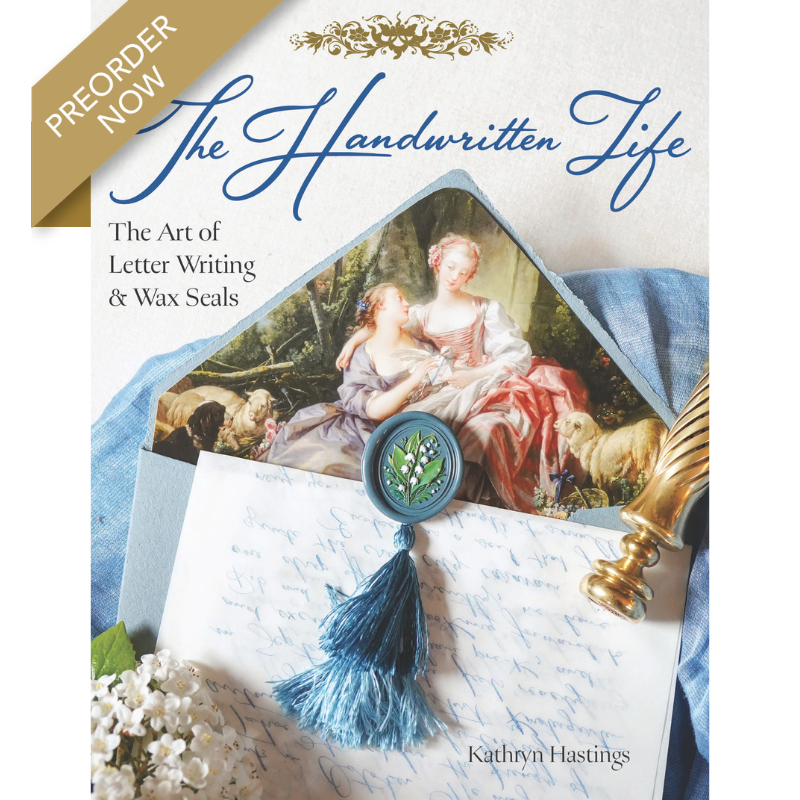 preorder_the-Handwritten-Life - Victoria Cover of 'The Handwritten Life: The Art of Letter Writing & Wax Seals' by Kathryn Hastings, featuring a blue tassel seal over a romantic painting with a PREORDER NOW ribbon.