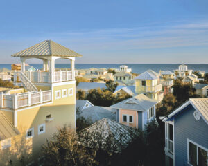 web - Victoria overview of pastel beach houses near the water in seaside, florida
